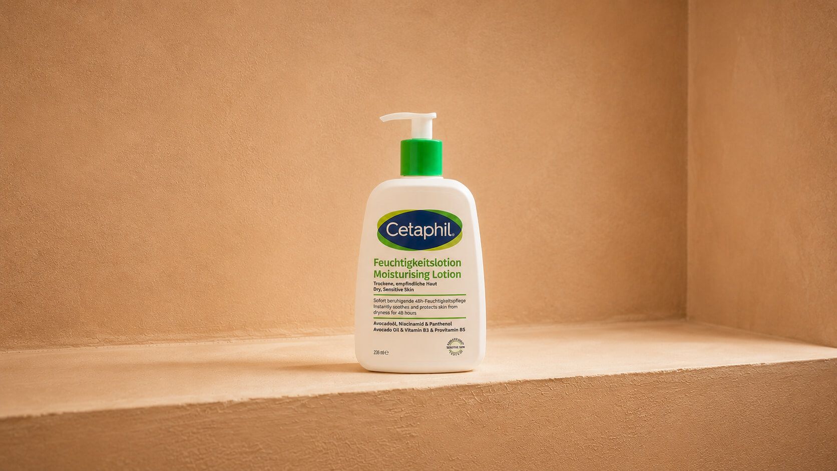 Cetaphil Daily Hydrating Lotion bottle with a green pump on a tan shelf.