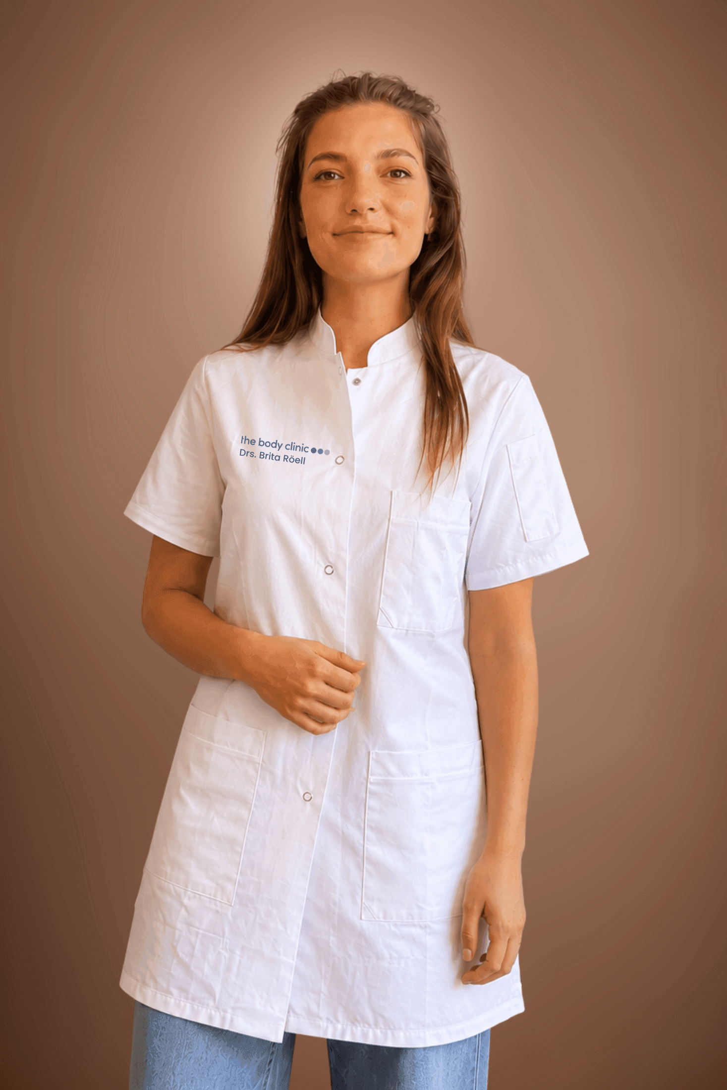 Young woman in white medical coat smiling subtly against a brown background.