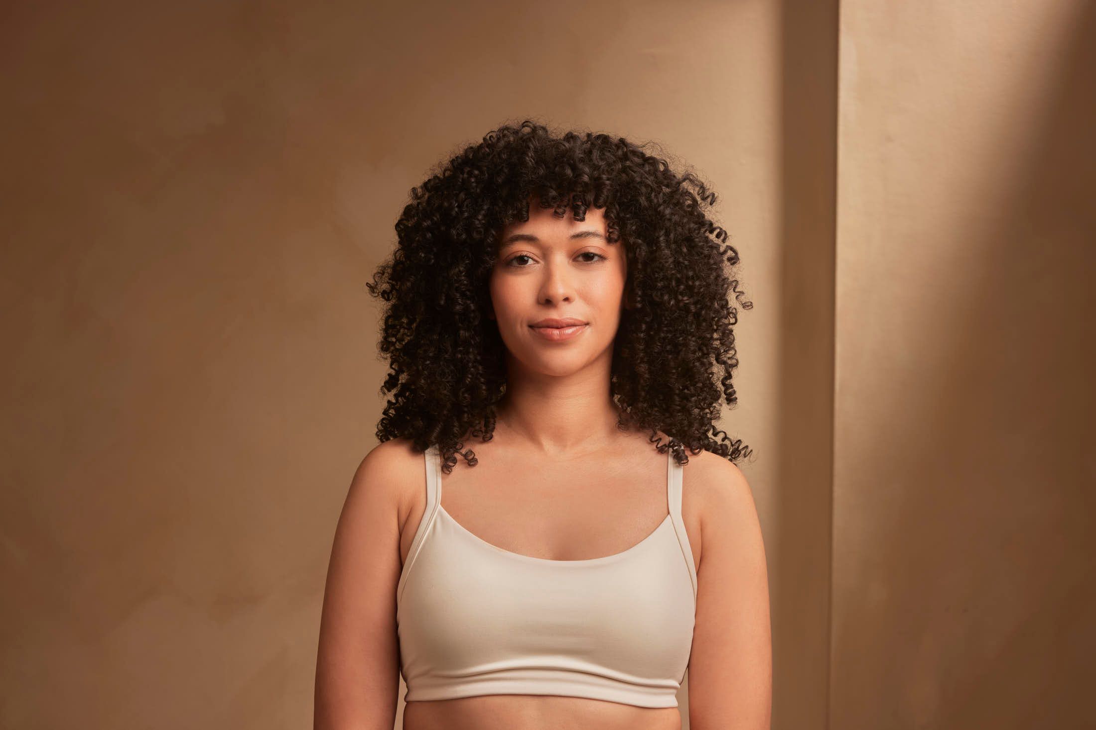 Client met gezonde huid bij overzicht van huidtherapie behandelingen bij The Body Clinic