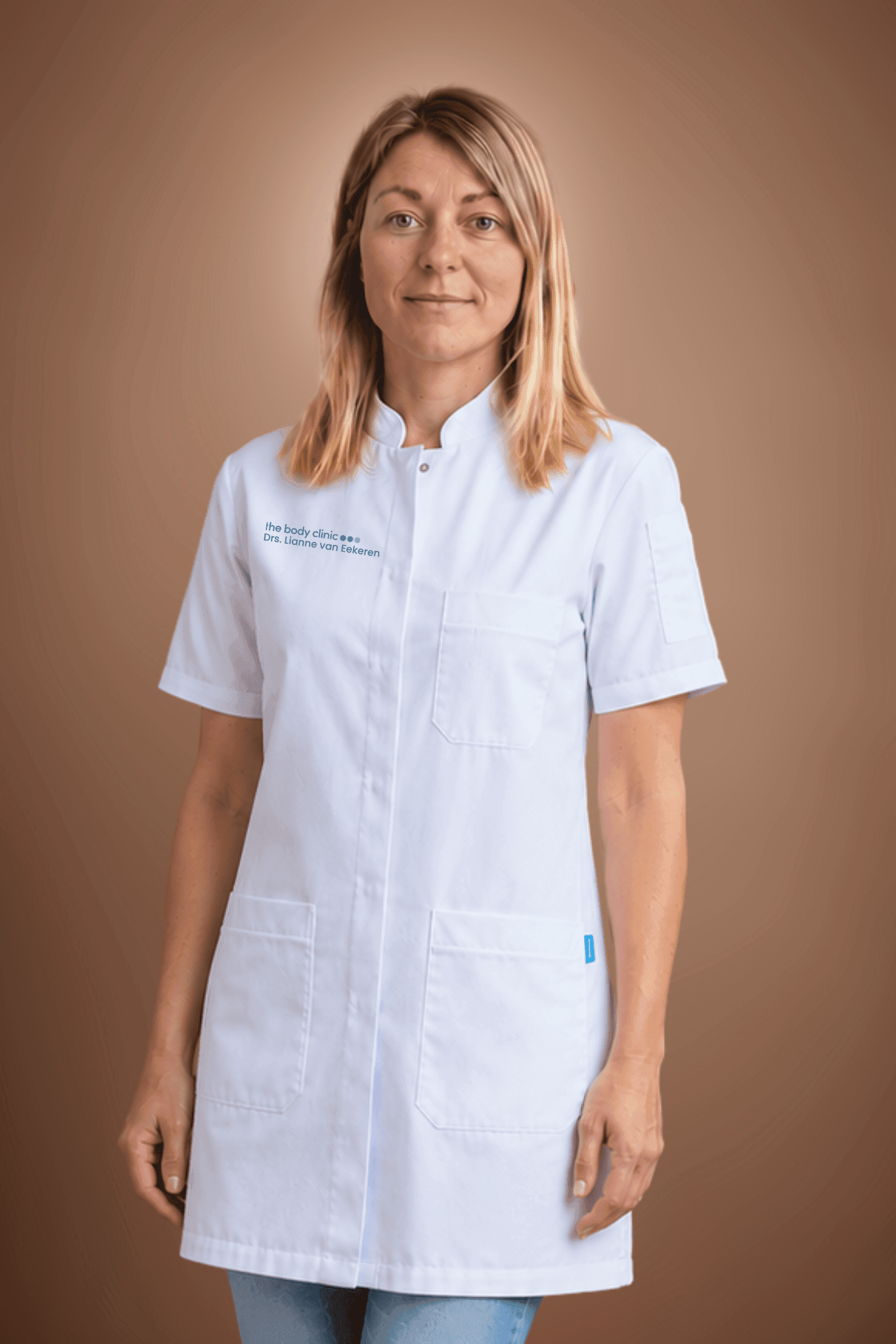 Professional woman with blonde hair wearing a white lab coat, smiling confidently at the viewer.