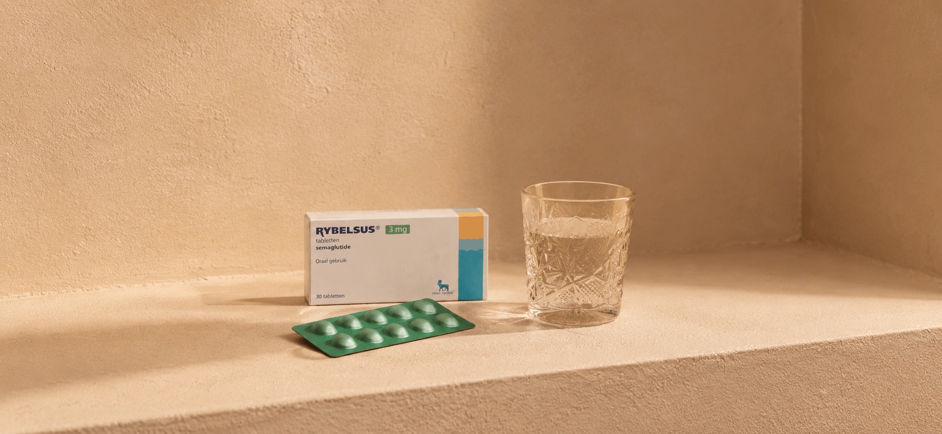 ADRENALAYER medication box, a blister pack of pills, and a glass of water.